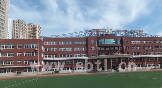 沈陽光明中學(xué)外墻仿磚涂料施工案例